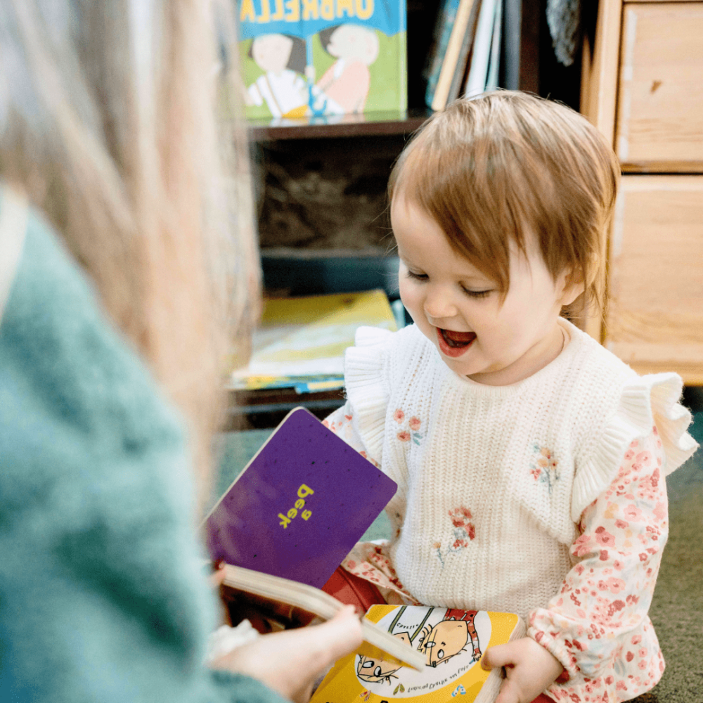 A small child reading a book