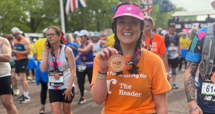 Runner with medal at TCS London Marathon